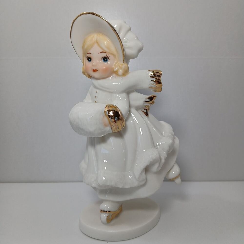 Classic Treasure Blonde Girl Skating Figurine White Gold OWFIG114 6"